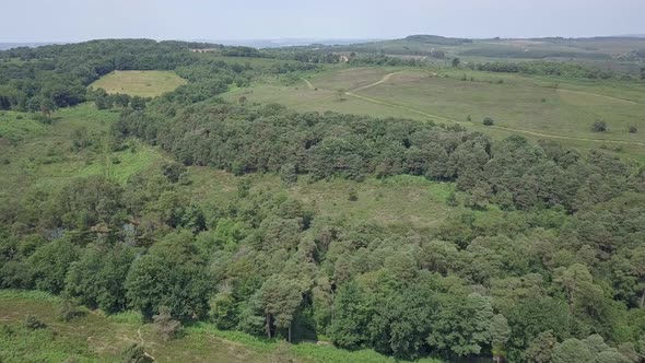 Flying high over Devon rural fields and woodlands