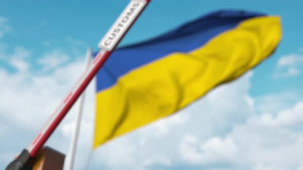 Barrier Gate with CUSTOMS Sign Being Closed at Flag of Ukraine alt