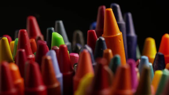 Rotating shot of color wax crayons for drawing and crafts