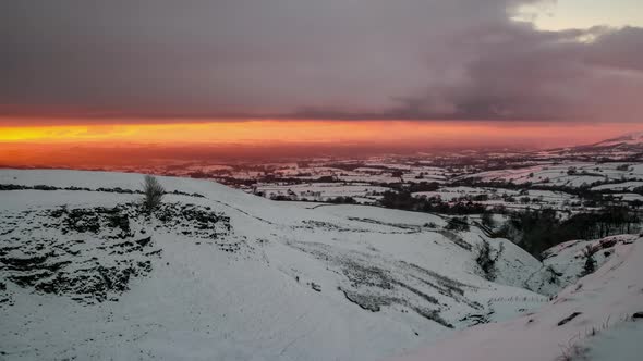 Sunset time-lapse over the snow covered Eden Valley North East Cumbria