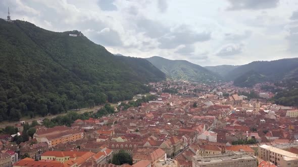 Aerial view of Brasov city, medieval town situated in Transylvania, Romania, Old architecture