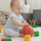 Cheerful Baby Boy Playing and Having Fun with Basketball on Floor at Living Room - VideoHive Item for Sale