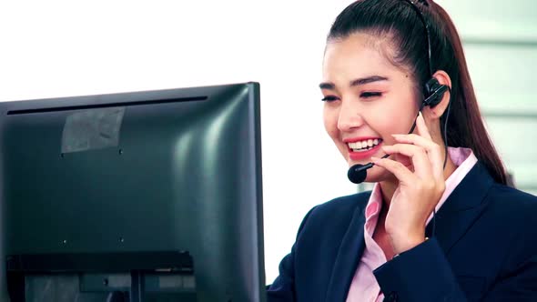 Business People Wearing Headset Working in Office