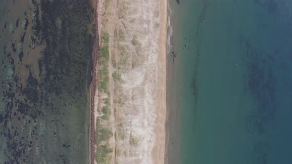 View From a Drone Vertically Down at Dawn to the Nazimov Sand Spit Russia