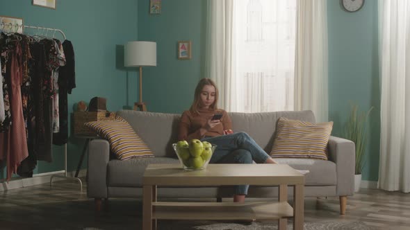 Pretty Lady with Red Apple and Phone