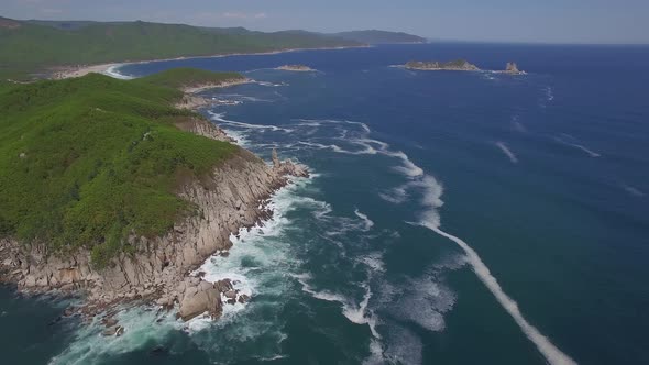 View From a Droneon a Stone Cape Washed By Strong Waves