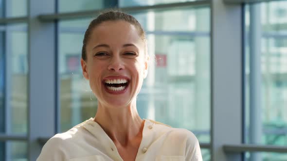 Portrait of a young businesswoman in a modern office building