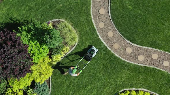 Aerial View Of Lawn Maintenance. 