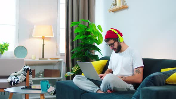 On the Sofa at Home Student Guy Have a College