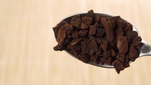 A full teaspoon of instant, natural chopped chicory root. Fall in slow motion