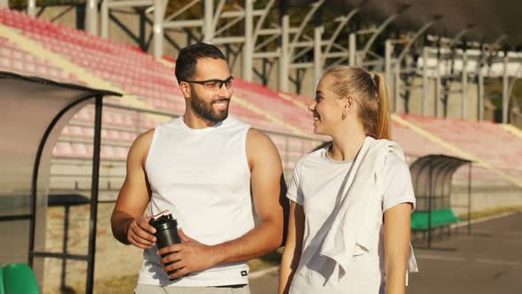 Joggers Walk in Stadium