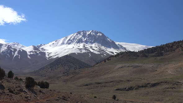 Snowy Mountain Peak in Shape of a Curved Semicircle and Dome