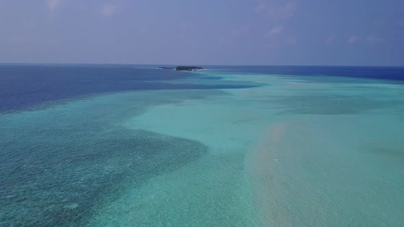 Drone aerial scenery of exotic resort beach wildlife by sea with sand background