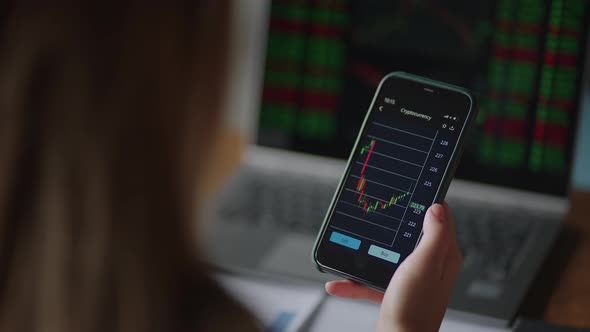Investor Checking Stock Market Data On Screen Mobile Phone