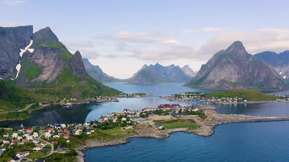 Flying Above Reine Fishing Village with Mountains and Fjords on Lofoten Islands