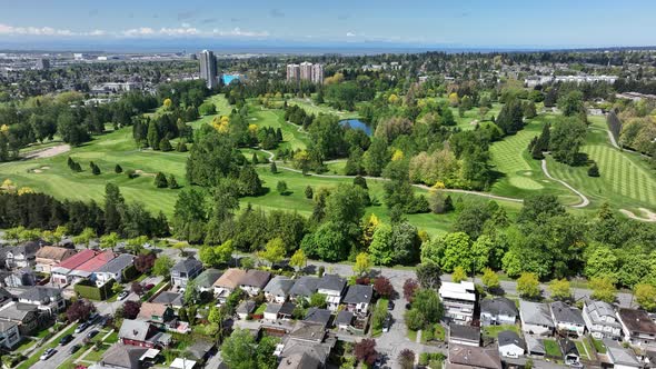 Evergreen And Lush Meadows Of a Golf Course in Oakridge Community In Vancouver, Canada. Wide