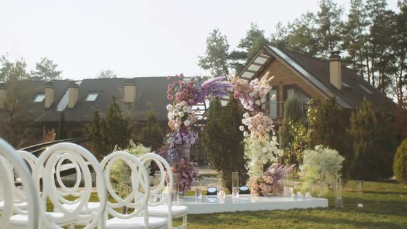 View of Wedding Floral Decorations of Flowers in Pastel Faded Colors Slow Motion Outside Wedding