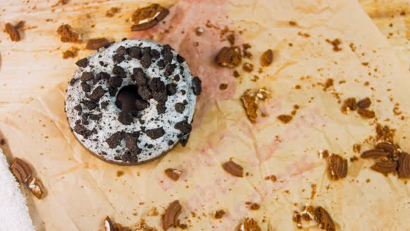 Chocolate Donuts Decorated with Pieces of Oreo Biscuits