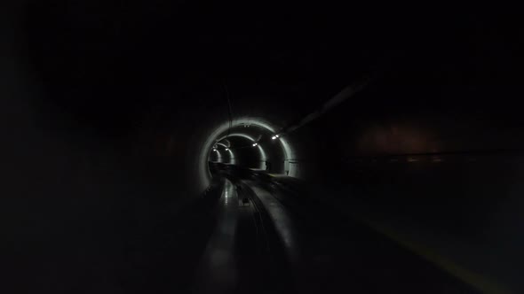 Underground tunnel, urban futuristic motion. Forward moving in subway tunnel lights.