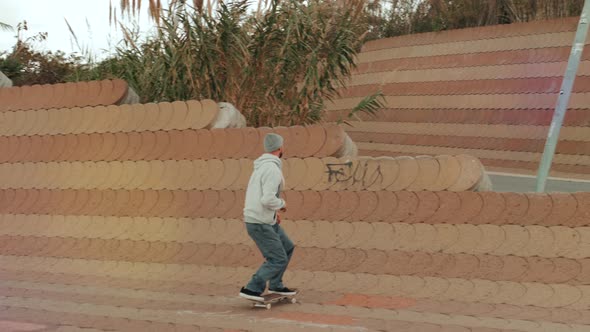 Skateboarder Doing Dangerous Stall Trick on Street, Skater Man Perform Extreme Big Gap Professional