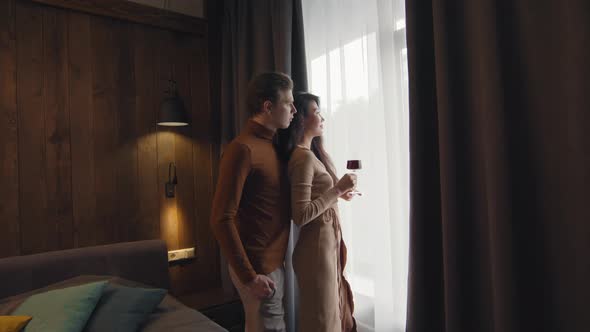 Romantic Couple On Date In Hotel