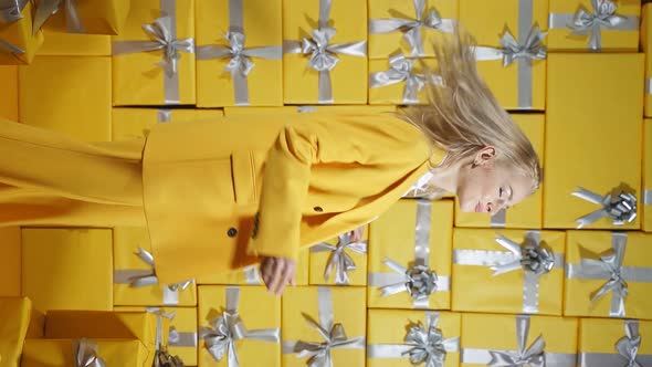 a Young Model in a Stylish Suit Poses in Front of the Camera on an Isolated Background From Gift