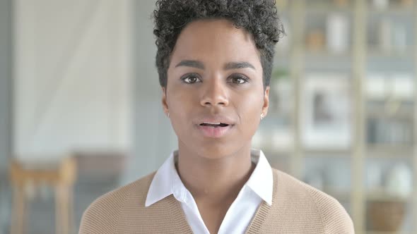 Portrait Shoot of African Girl Doing Winner Gesture