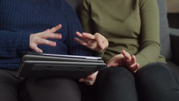 Deaf-mute Women Working with Digital Tablet Indoor