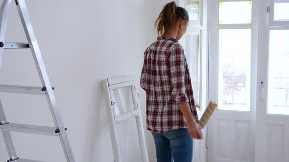 Woman Thinks, Plans, Decides About Repair Her House, Uses a Tablet or Mobile