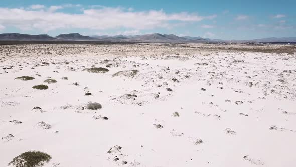 Beautiful desert and dunes view from above with sun and shadows on the sand - amazing nature