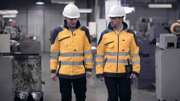 Two Engineers at an Industrial Plant