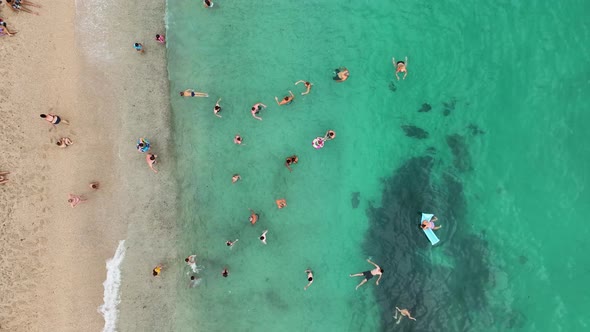 People swim in the sea aerial view 4 K Turkey Alanya