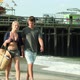 Teenage couple walking hand in hand on beach - VideoHive Item for Sale