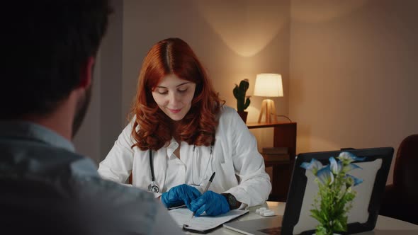 Italian Female Doctor and Patient Behind Anonymous Man in Private Clinic