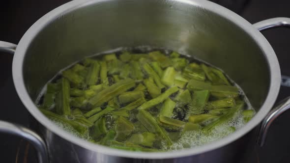 Cactus food gently simmering in boiling water cooking. A traditional native Mexican dish and street