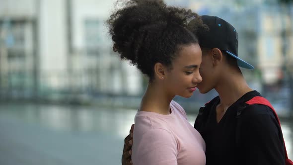 Happy African Student Hugging Girlfriend, College Pupils Love Romantic Feeling