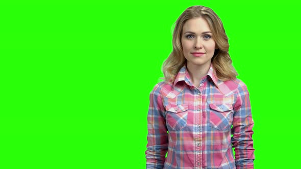 Happy Woman Showing Something on Green Screen