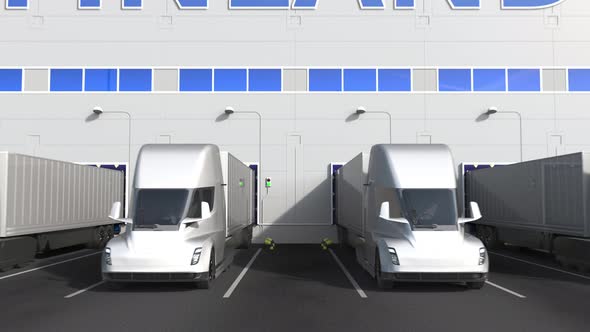 Electric Trailer Trucks at Warehouse with PRODUCT OF FINLAND Text