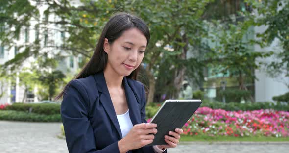 Asian Businesswoman use of tablet computer 