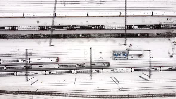 The Snowcovered Train Stops at the Station