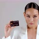 Beautiful Asian businesswoman showing credit card and looking at camera - VideoHive Item for Sale