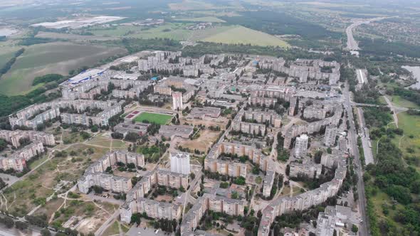 Aerial Panorama on City with Multi-Story Buildings Near Nature and River