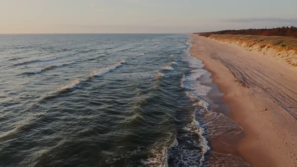 Panoramic View of a Deserted Beach Washed By Sea Waves