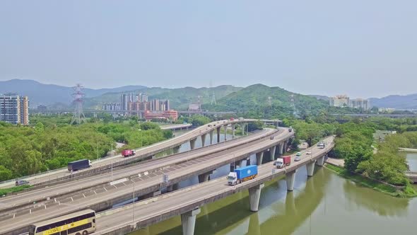 A dynamic ascending aerial footage of the highway above waters in Yuen Long in Hong Kong. Yuen Long