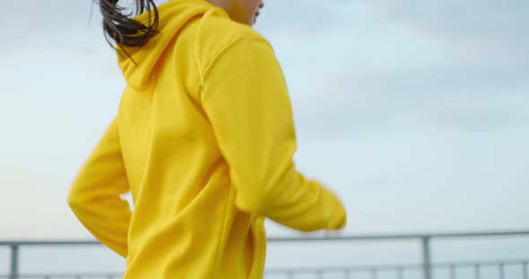 Young Woman Running In The Park