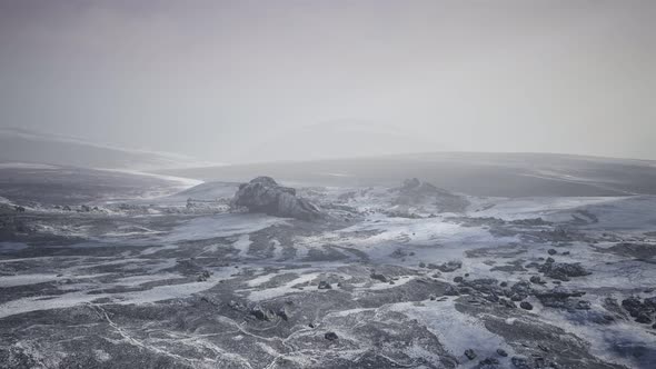 Antarctic Mountains with Snow in Fog