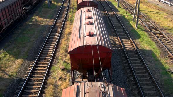 Container Freight Train with Many Cargo Wagons Transporting