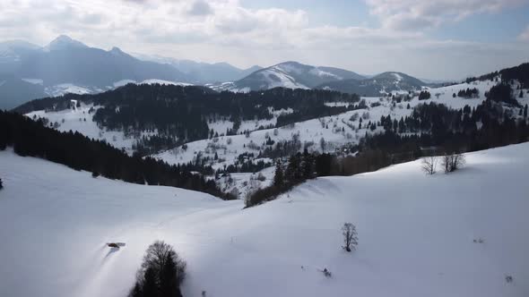 A Bird's Eye View of a Winter Mountain Rural Landscape