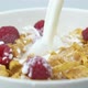Pouring Milk On Cereals With Raspberry - VideoHive Item for Sale