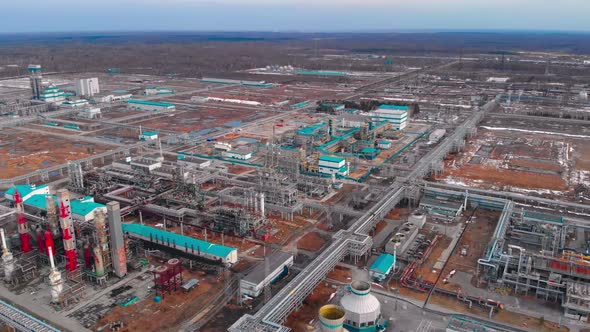 The Drone Flies Over a Huge Industrial Complex for the Deep Processing of Oil and Gas Into Polymer